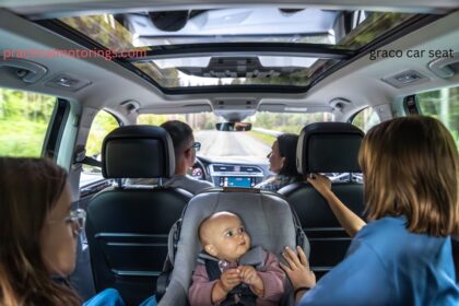 Graco car seat installed in back seat of a car for child safety