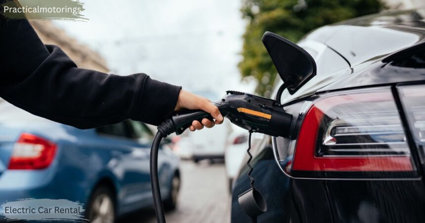 Person charging an electric rental car at a public EV charging station, illustrating electric car rental and sustainable transportation in Canada.