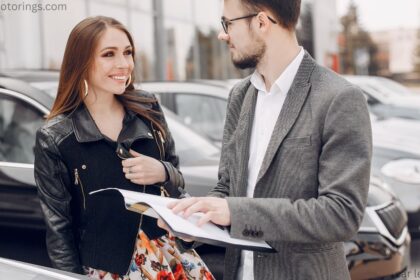 Car lease Regina agreement with SUV parked at local dealership